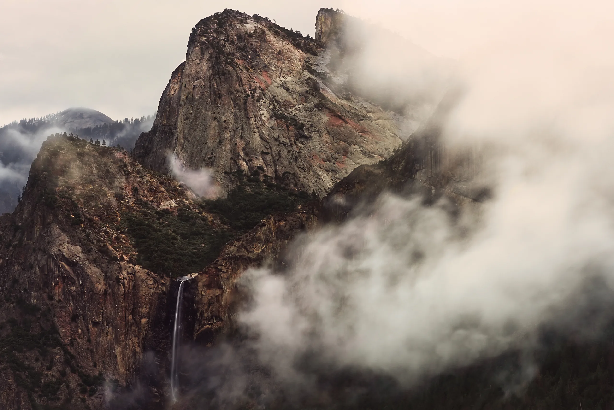 Fog and clouds surrounding Bridal Veil Falls.