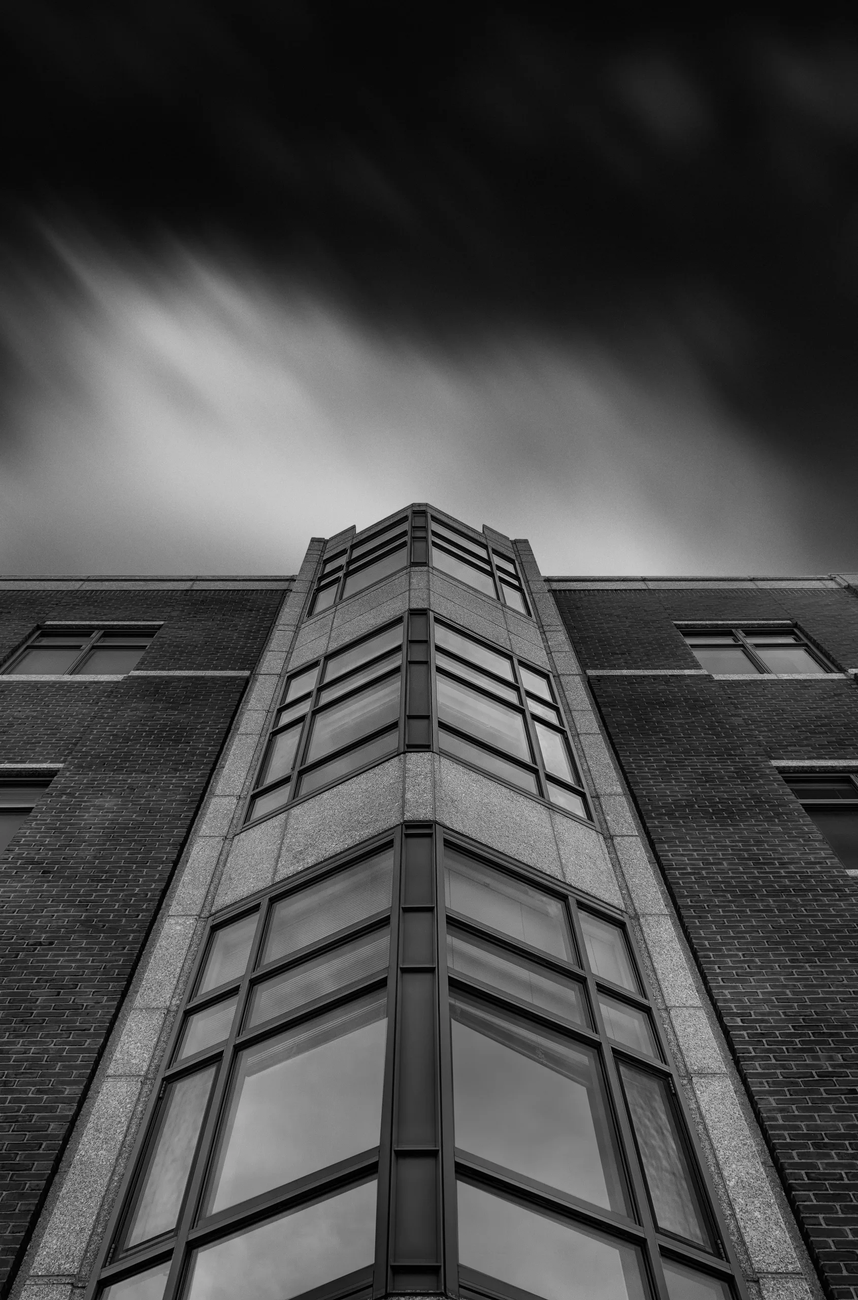 Black and white long exposure of Rudman Hall on the UNH campus.