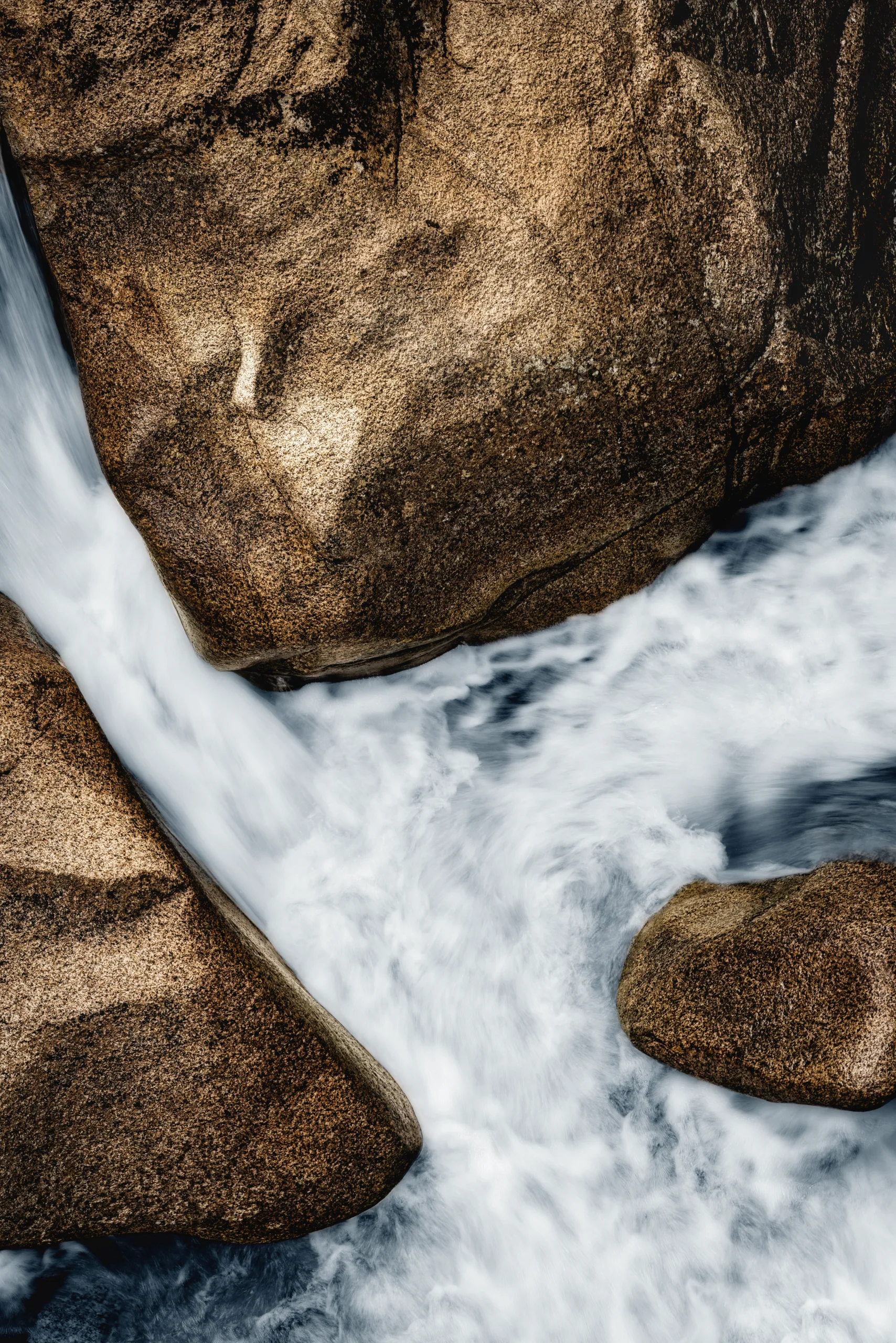 Rushing water through rocks at Franconia Notch State Park.